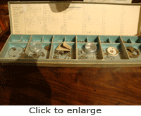 Historical watchmaking parts from the Longines archives.