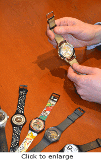 Fashion-oriented Swatch watches with quartz technology compared with a mechanical watch.